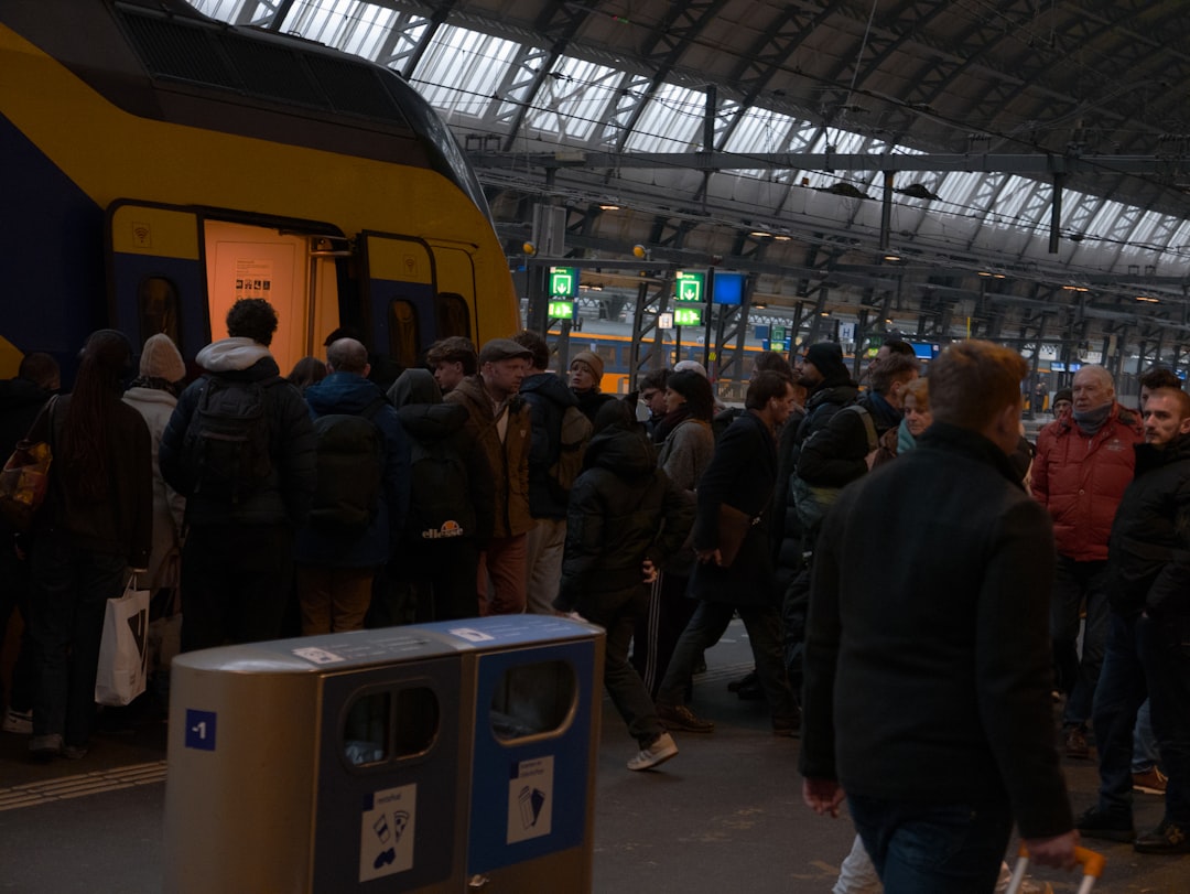 Nomad Protocol | Practical Solo Travel Traveler checking a train route map