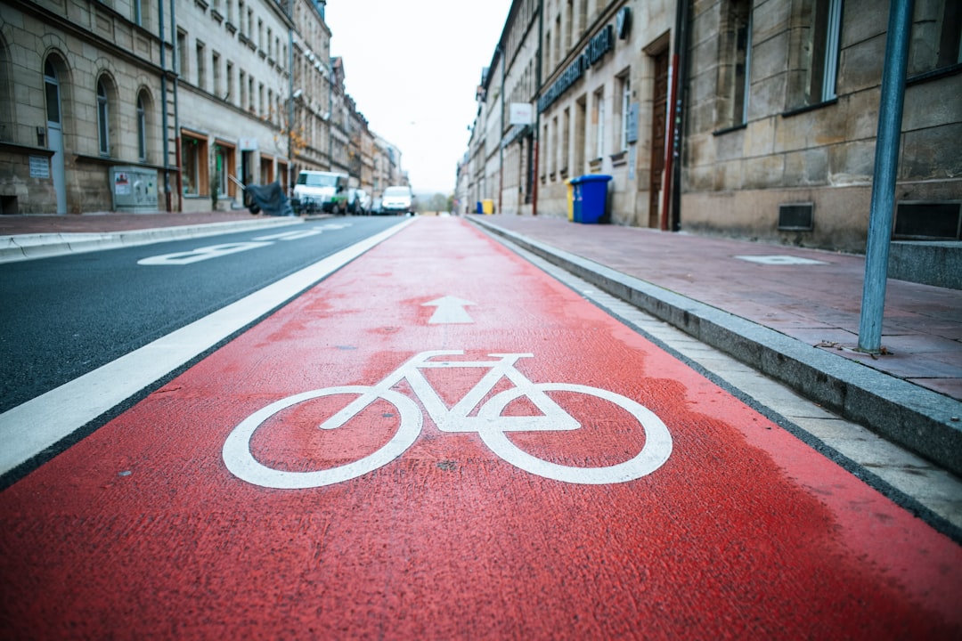 Nomad Protocol | Practical Solo Travel Cyclist navigating an urban street